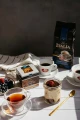 Herbata Czarna Aromatyzowana  W porcjach  Dilmah Italian Almond Tea [20x2g] - Cejlońska czarna herbata z aromatem włoskich migdałów.    20 stożkowych torebek ekspresowych 2g z zawieszką 2