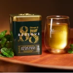 Herbata zielona z dodatkami ekspresowa w puszce - Dilmah 85 Reserve Ceylon Green Tea With Mint [20x2g]  - Cejlońska zielona herbata z dodatkiem liści mięty i olejku miętowego - 20 stożkowych torebek ekspresowych 2g z zawieszką w puszce 3